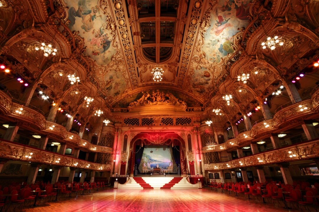 Elegant ballroom with grand chandelier and soft evening light
